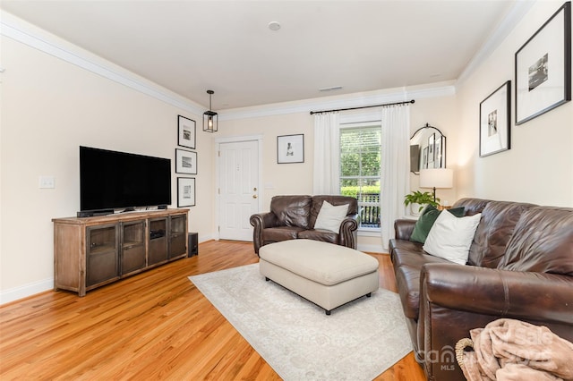 7344 Gilead Rd, Huntersville, NC 28078 - living area featuring ornamental molding and light wood-type flooring