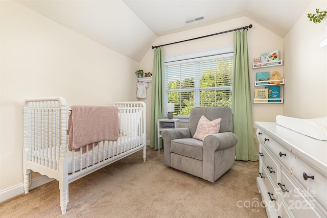 7344 Gilead Rd, Huntersville, NC 28078 - bedroom with lofted ceiling, light carpet, and a crib