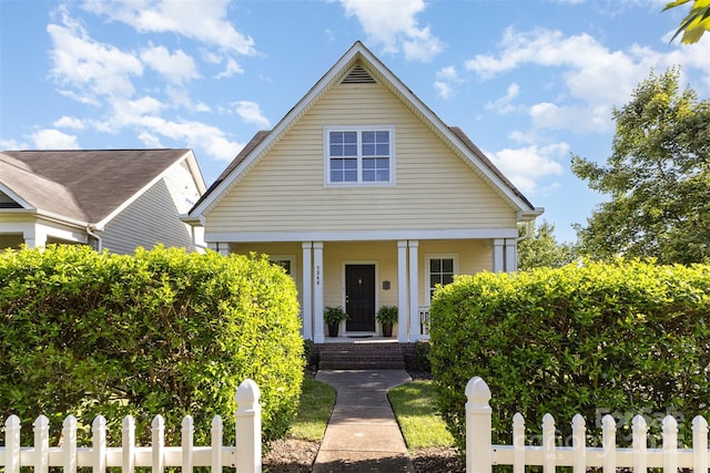 7344 Gilead Rd, Huntersville, NC 28078 - neoclassical home with covered porch and a fenced front yard