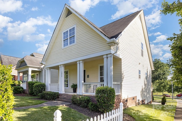 7344 Gilead Rd, Huntersville, NC 28078 - view of front of house with a porch and a front yard