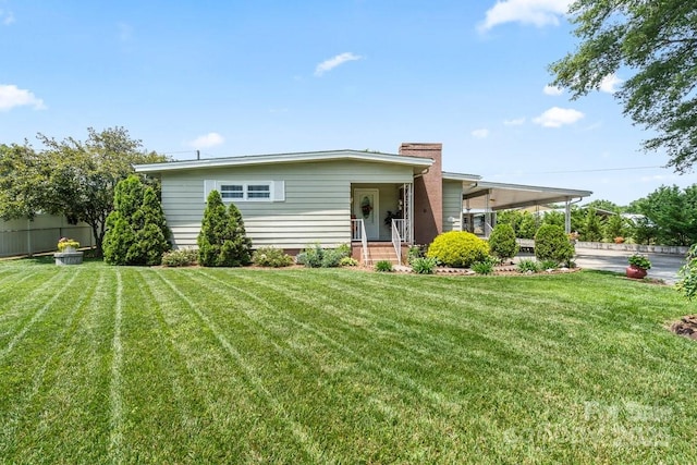 1627 33rd Ave NE, Hickory, NC 28601 - manufactured / mobile home with an attached carport, a chimney, and a front yard