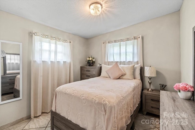 1627 33rd Ave NE, Hickory, NC 28601 - bedroom featuring light tile patterned floors and a textured ceiling