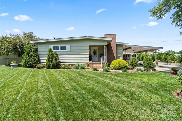 1627 33rd Ave NE, Hickory, NC 28601 - view of front facade featuring a chimney and a carport