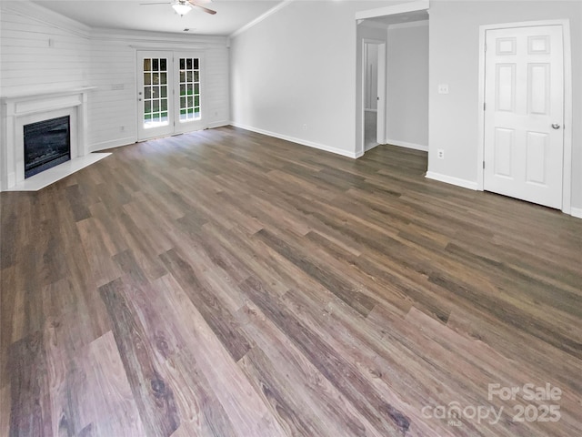 2010 Kansas City Dr, Monroe, NC 28110 - unfurnished living room with a ceiling fan, crown molding, a fireplace with flush hearth, and dark wood finished floors