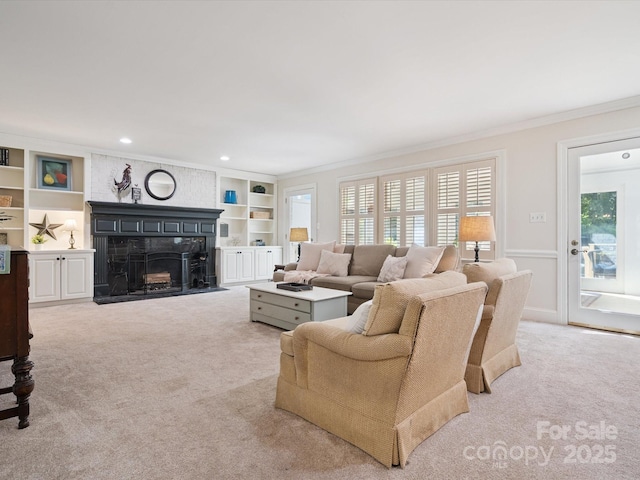 2032 Greenbrook Pkwy, Matthews, NC 28104 - living room with carpet flooring, crown molding, a fireplace, built in features, and recessed lighting