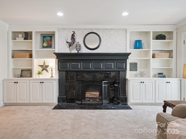 2032 Greenbrook Pkwy, Matthews, NC 28104 - living room with carpet, a large fireplace, built in features, ornamental molding, and recessed lighting