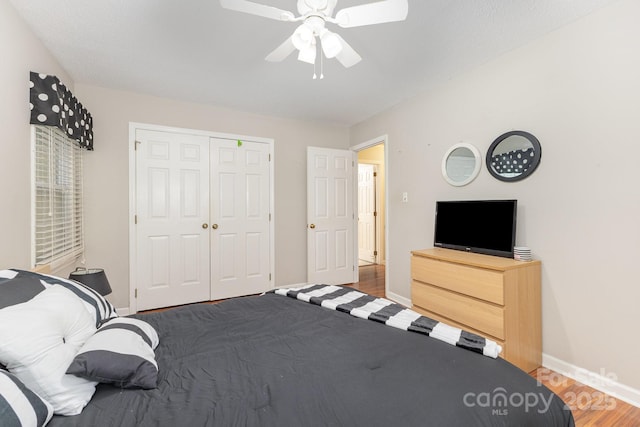 713 Hickory Hill Ct, Gastonia, NC 28054 - bedroom with wood finished floors, a closet, and ceiling fan