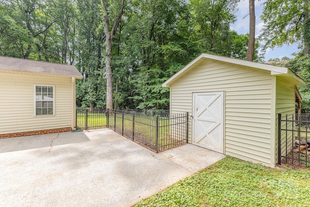 713 Hickory Hill Ct, Gastonia, NC 28054 - view of shed featuring view of wooded area