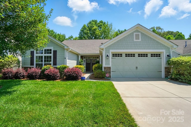9330 Carneros Creek Rd, Charlotte, NC 28214 - craftsman house featuring a garage, driveway, a front yard, and stone siding