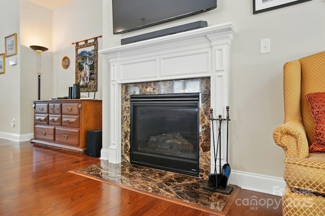 9330 Carneros Creek Rd, Charlotte, NC 28214 - detailed view of wood finished floors and a fireplace