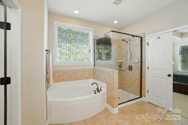 9330 Carneros Creek Rd, Charlotte, NC 28214 - full bathroom with a bath, a stall shower, tile patterned flooring, healthy amount of natural light, and recessed lighting