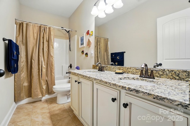 9330 Carneros Creek Rd, Charlotte, NC 28214 - bathroom featuring double vanity, shower / bath combo with shower curtain, and tile patterned floors