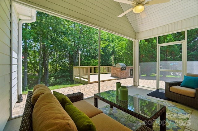 9330 Carneros Creek Rd, Charlotte, NC 28214 - sunroom featuring vaulted ceiling, area for grilling, a ceiling fan, and plenty of natural light