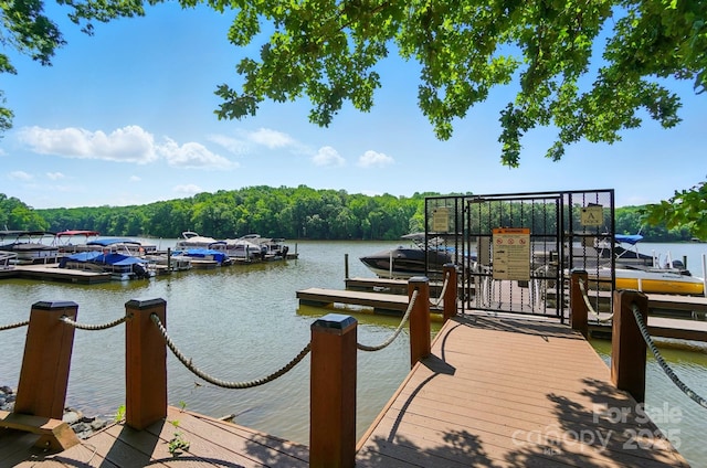 9330 Carneros Creek Rd, Charlotte, NC 28214 - dock featuring a water view and a wooded view