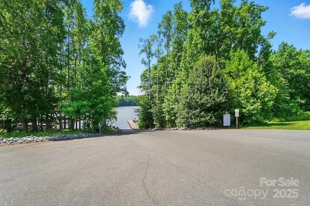9330 Carneros Creek Rd, Charlotte, NC 28214 - view of asphalt road featuring a water view