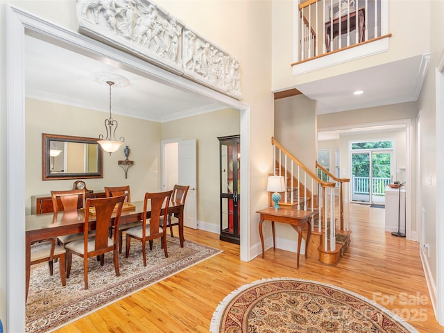 1 Hickory Rdg, Fletcher, NC 28732 - dining room featuring wood finished floors, stairs, and ornamental molding