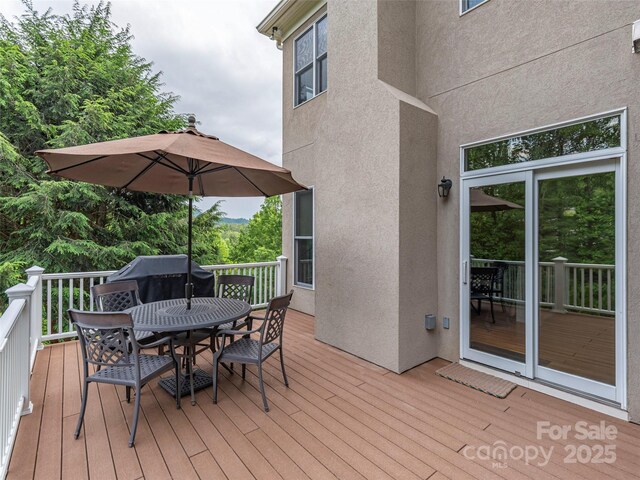 1 Hickory Rdg, Fletcher, NC 28732 - wooden terrace with outdoor dining area and area for grilling