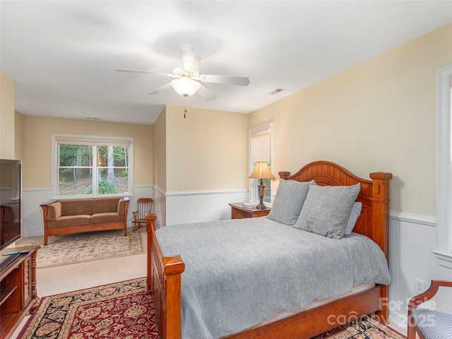 1 Hickory Rdg, Fletcher, NC 28732 - bedroom with a wainscoted wall, carpet, and a ceiling fan