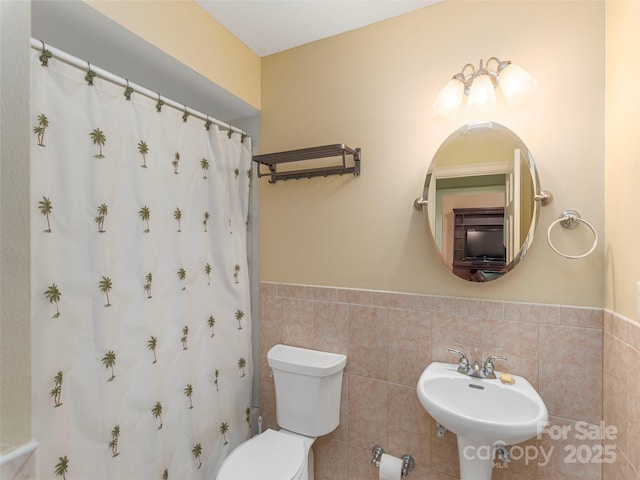 1 Hickory Rdg, Fletcher, NC 28732 - bathroom featuring tile walls, curtained shower, and a wainscoted wall