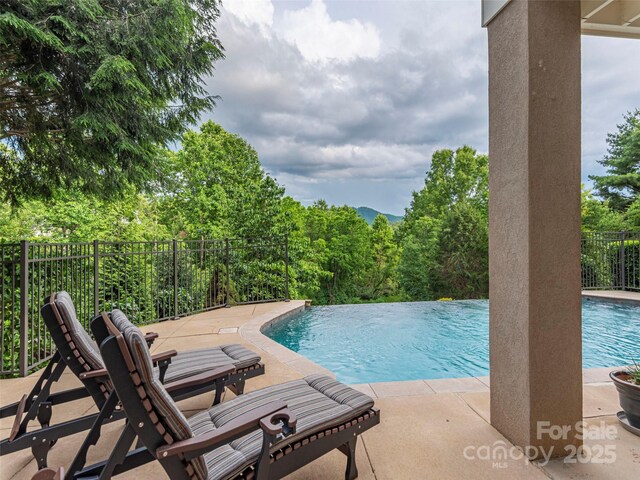 1 Hickory Rdg, Fletcher, NC 28732 - view of swimming pool with an infinity pool and a patio