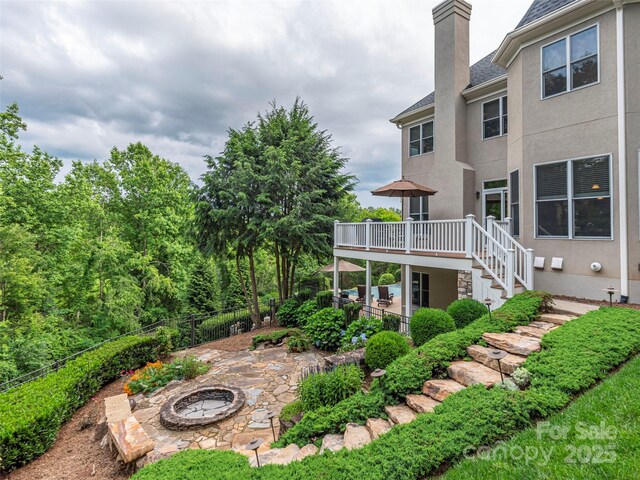 1 Hickory Rdg, Fletcher, NC 28732 - view of yard featuring stairs, an outdoor fire pit, a deck, and a patio