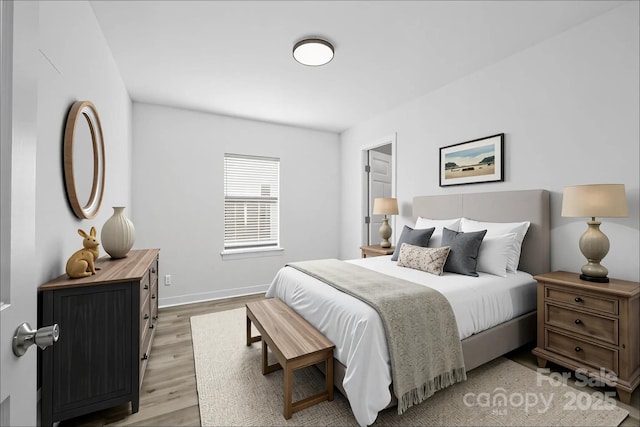 3433 Spinner Ct, Sherrills Ford, NC 28673 - bedroom featuring light wood-type flooring and baseboards