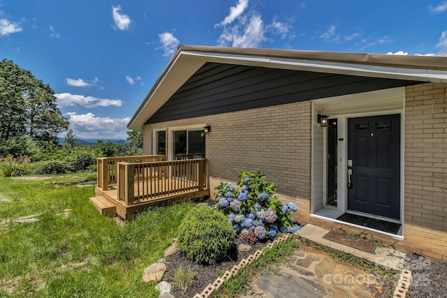 41 Remembrance Rdg, Flat Rock, NC 28731 - entrance to property featuring brick siding and a wooden deck