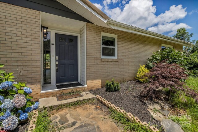 41 Remembrance Rdg, Flat Rock, NC 28731 - view of exterior entry featuring brick siding