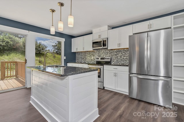 41 Remembrance Rdg, Flat Rock, NC 28731 - kitchen featuring stainless steel appliances, tasteful backsplash, dark wood-type flooring, and white cabinets
