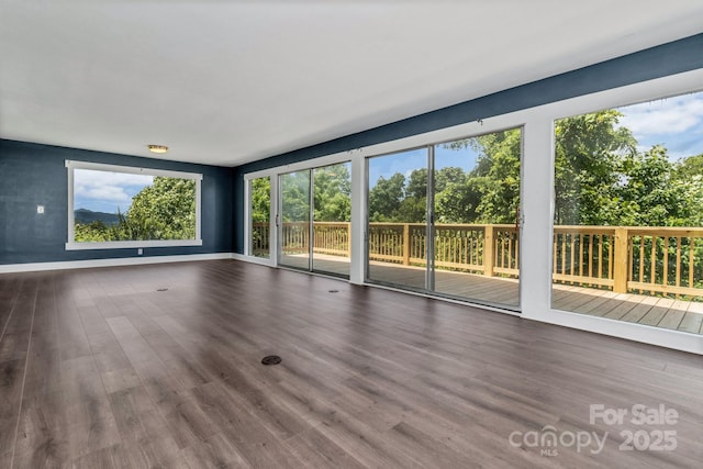 41 Remembrance Rdg, Flat Rock, NC 28731 - unfurnished room with healthy amount of natural light and wood finished floors