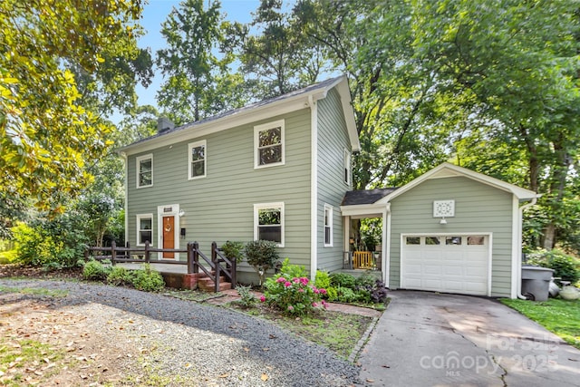 2034 Lanier Ave, Charlotte, NC 28205 - view of front of property featuring an attached garage, concrete driveway, and a deck