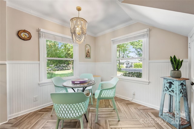 2034 Lanier Ave, Charlotte, NC 28205 - dining room featuring wainscoting, a chandelier, and lofted ceiling