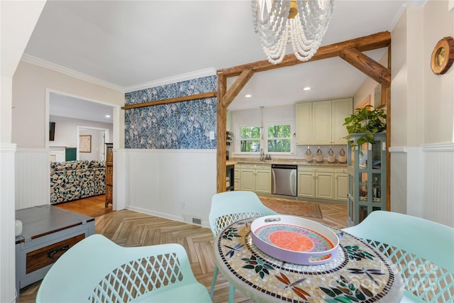 2034 Lanier Ave, Charlotte, NC 28205 - dining space featuring a chandelier, wainscoting, and crown molding