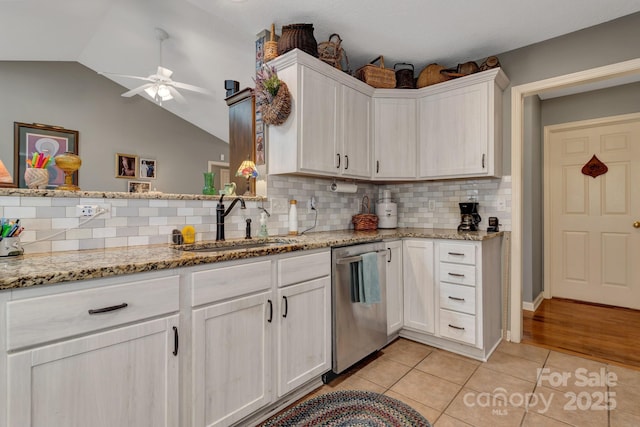 16 Sunview Cir, Arden, NC 28704 - kitchen featuring stainless steel dishwasher, ceiling fan, light tile patterned floors, backsplash, and white cabinetry