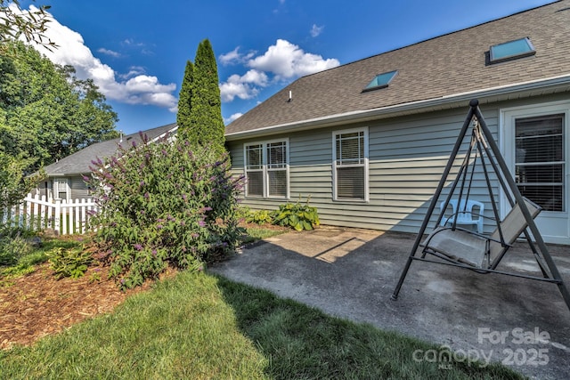 16 Sunview Cir, Arden, NC 28704 - back of property featuring roof with shingles and a patio