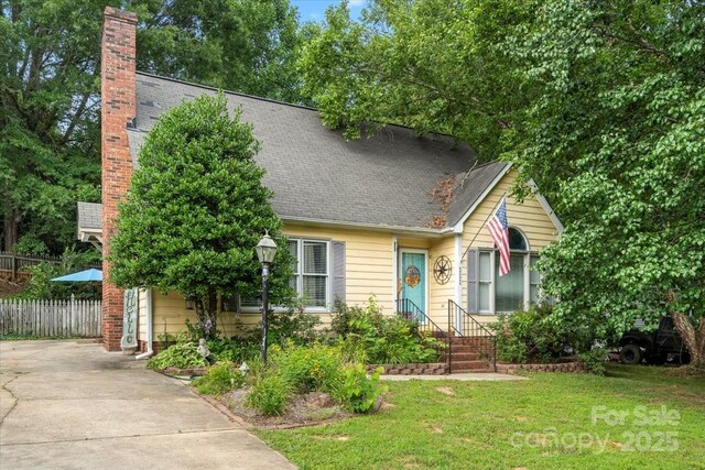111 Beacon Hills Dr, Gastonia, NC 28056 - view of front of property with a chimney and roof with shingles