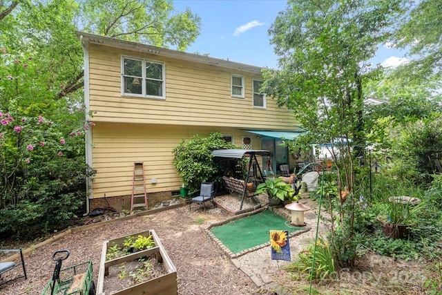 111 Beacon Hills Dr, Gastonia, NC 28056 - back of property with a vegetable garden