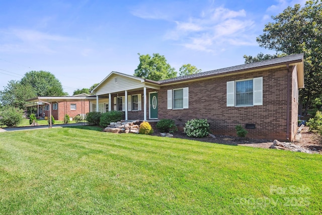 203 Shuping St, Morganton, NC 28655 - ranch-style house featuring brick siding, a front lawn, covered porch, and crawl space