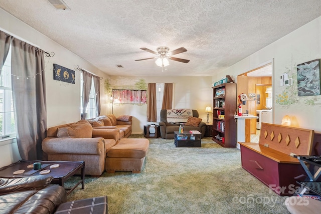 203 Shuping St, Morganton, NC 28655 - carpeted living area featuring a textured ceiling and a ceiling fan