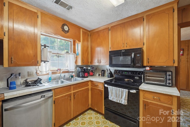 203 Shuping St, Morganton, NC 28655 - kitchen with black appliances, light countertops, a textured ceiling, tasteful backsplash, and brown cabinetry