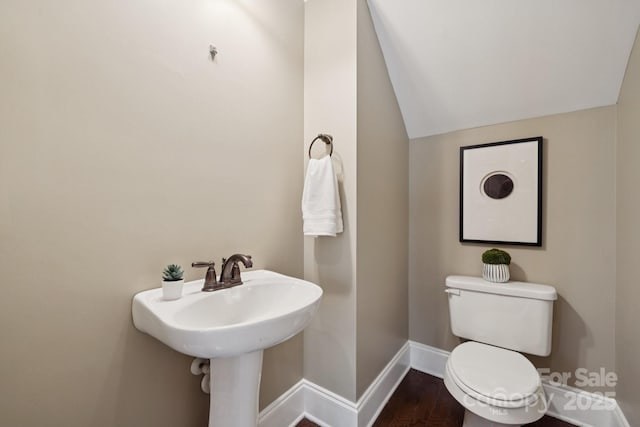 12525 Druids Glen Dr, Pineville, NC 28134 - half bathroom with wood finished floors and lofted ceiling
