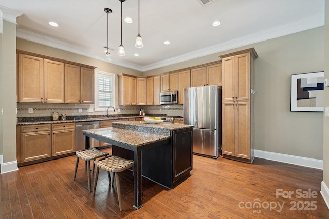 12525 Druids Glen Dr, Pineville, NC 28134 - kitchen featuring stainless steel appliances, a breakfast bar area, tasteful backsplash, dark wood-style floors, and crown molding