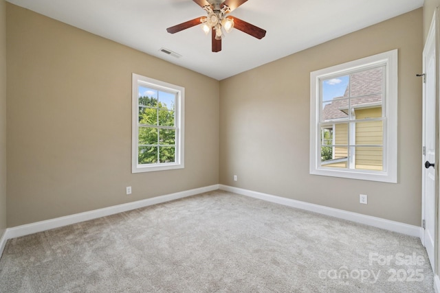 12525 Druids Glen Dr, Pineville, NC 28134 - spare room with carpet floors and ceiling fan