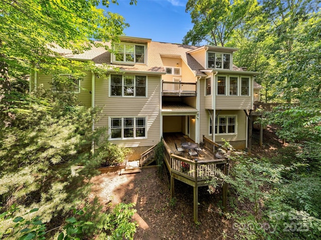 303 S Braeside Ct, Asheville, NC 28803 - back of property with a deck, a balcony, and a shingled roof