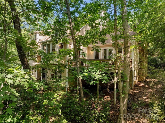 303 S Braeside Ct, Asheville, NC 28803 - view of front of house featuring a deck and a shingled roof