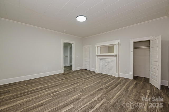 613 E Liberty St, Salisbury, NC 28144 - unfurnished bedroom with ornamental molding, dark wood-type flooring, and a closet