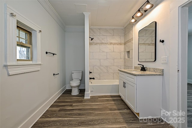 613 E Liberty St, Salisbury, NC 28144 - full bath featuring crown molding, vanity, wood finished floors, and shower / tub combination