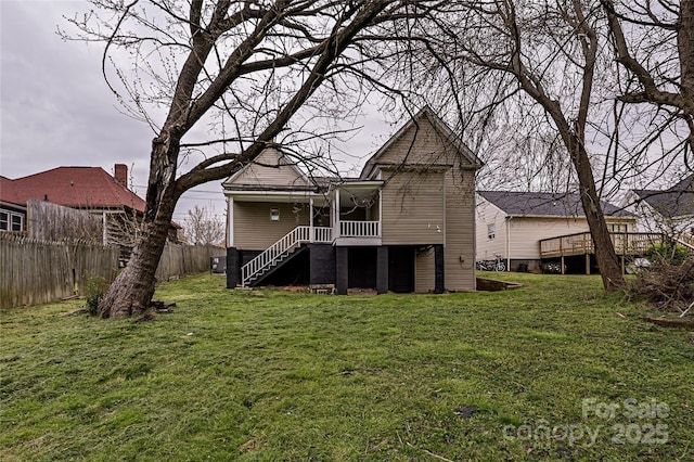 613 E Liberty St, Salisbury, NC 28144 - back of house with stairs and a wooden deck