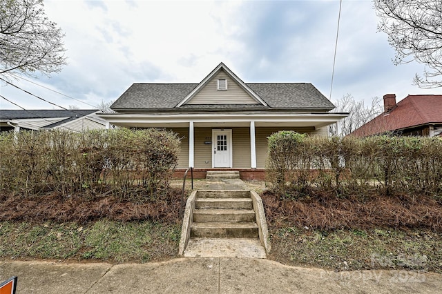 613 E Liberty St, Salisbury, NC 28144 - bungalow featuring covered porch and a shingled roof