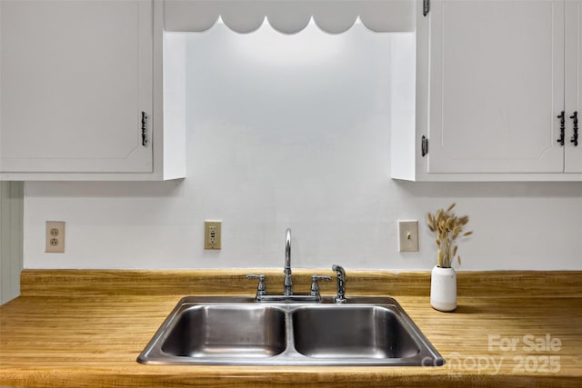 2526 Hankins Rd, Marion, NC 28752 - kitchen featuring white cabinets and light countertops